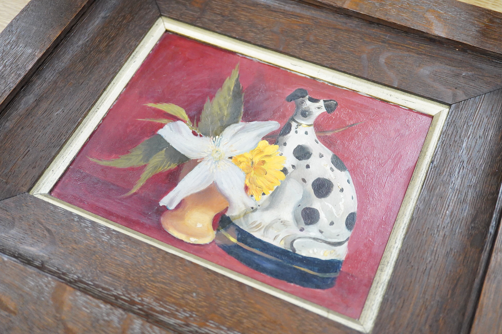 20th century School, Still life of a Staffordshire dog and flowers in a vase, oil on board, 14 x 18cm